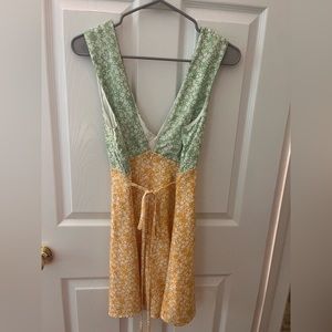Boutique dress. Green top part and yellow bottom.